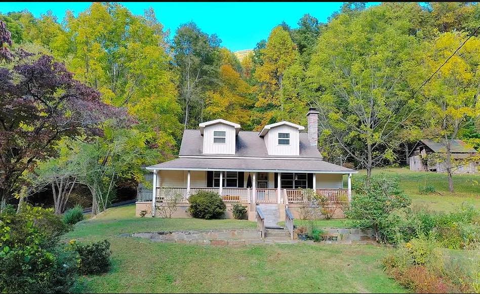 Love the setting! Mountain house in NC on almost 10 acres. $299,800